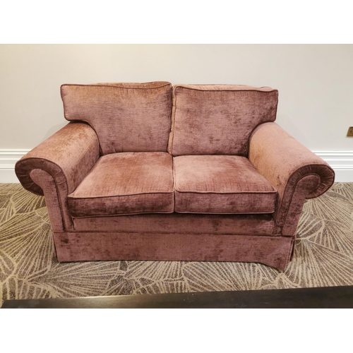139B - Mahogany and crushed velvet upholstered two seater sofa.