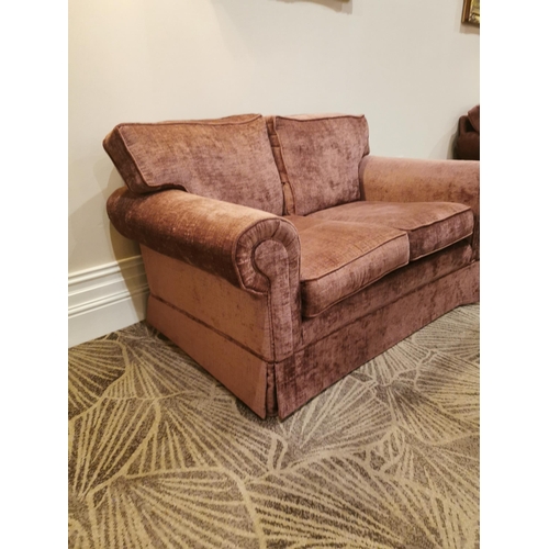 139B - Mahogany and crushed velvet upholstered two seater sofa.