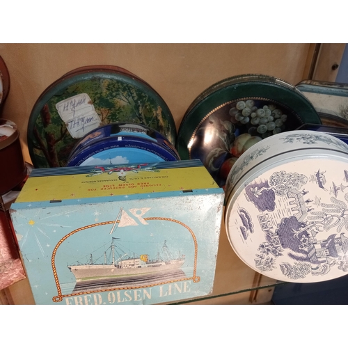 1026 - Collection of eleven biscuit tins, including Fred Olsen line {H 23cm down to H 10cm}