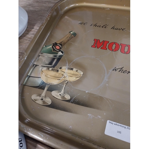 105 - We shall have Moussec wherever we go tin plate advertising tray. {34 cm H x 34 cm W}.