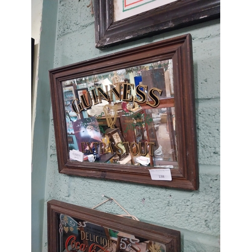 138 - Guinness Extra Stout framed advertising mirror. {25 cm H x 23 cm W}.
