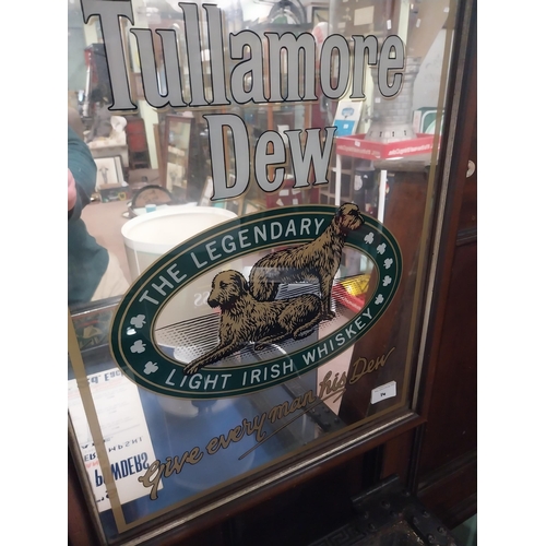 14 - Framed Tullamore Dew advertising mirror. {57 cm H x 47 cm W}.
