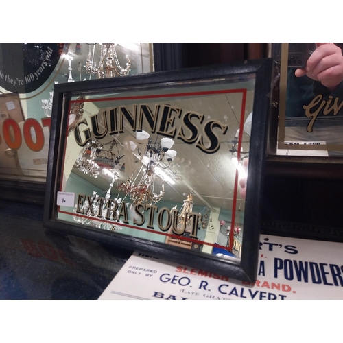 16 - Framed Guinness Extra Stout mirror. {22 cm H x 33 cm W}.