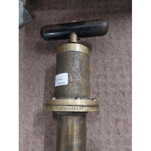 19 - 1920's brass hand pump. {47 cm H x 16 cm W}.