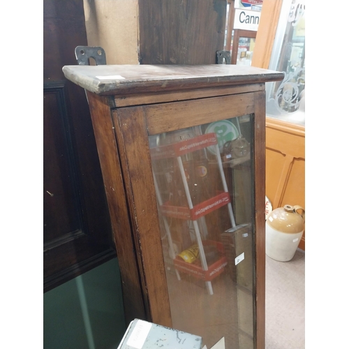 21 - Early 20th C. mahogany display cabinet with glazed single door. {130 cm H x 48 cm W x 13 cm D}.