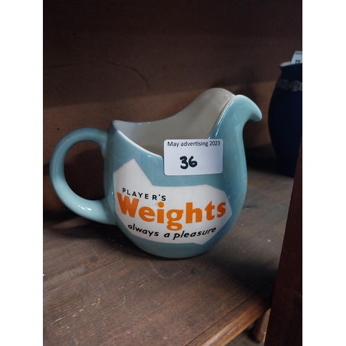36 - Ceramic Player's Weights advertising jug. {12 cm H x 16 cm W x 9 cm D}.