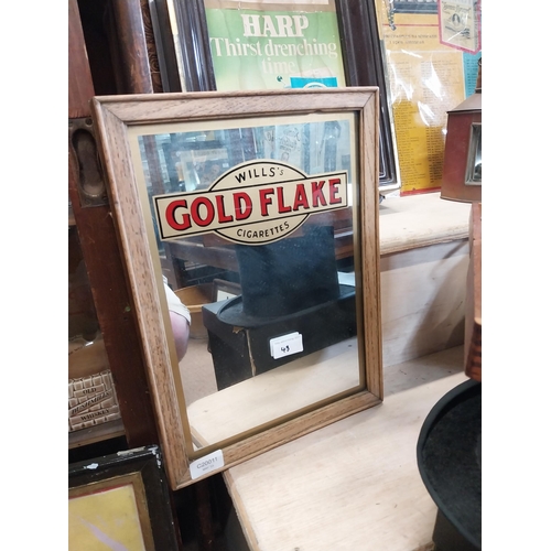 48 - 1930's Wills Gold Flake framed advertising mirror. {39 cm H x 29 cm W}.