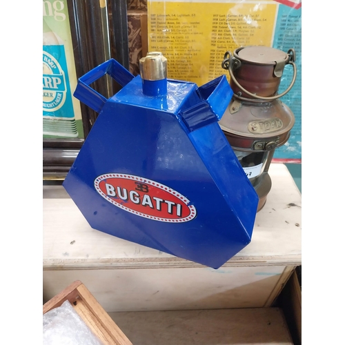 49 - Bugatti tin plate and brass oil can. {24 cm H x 24 cm W x 7 cm D}.