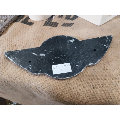 73 - Mini alloy advertising sign. {12 cm H x 26 cm W}.