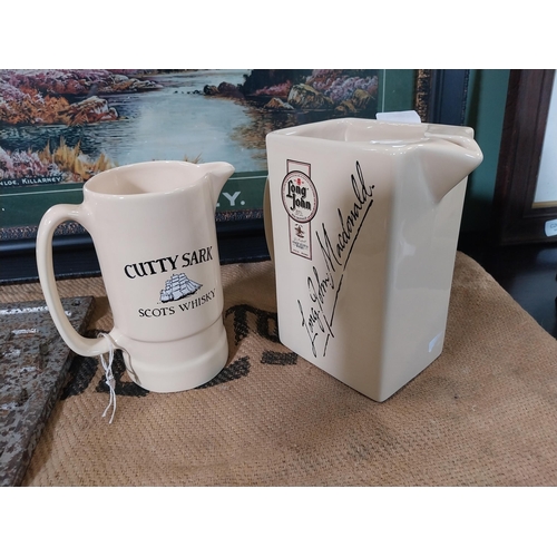 74 - Cutty Sark and Long John McDonald Whiskey ceramic advertising jug. {16 cm H x 15 cm W x 9 cm D} and ... 