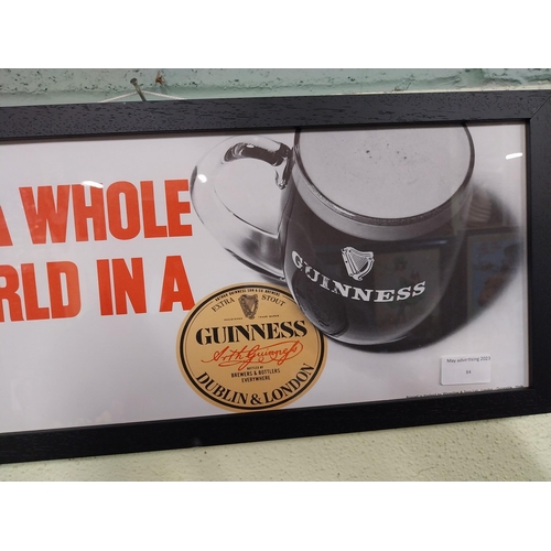 84 - There's a whole world of Guinness framed print. {29 cm H x 50 cm W}.