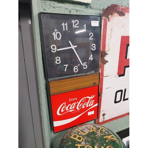 89 - Coca Cola advertising clock. {54 cm H x 26 cm W x 6 cm D}.