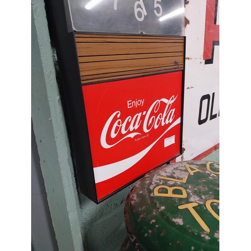 89 - Coca Cola advertising clock. {54 cm H x 26 cm W x 6 cm D}.