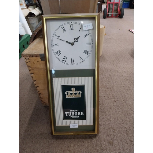 912 - Tuborg Lager advertising clock. {55 cm H x 25 cm W}