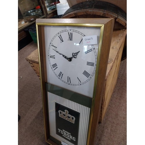 912 - Tuborg Lager advertising clock. {55 cm H x 25 cm W}