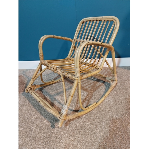 38 - 1950s bentwood child's rocking chair {55 cm H x 43 cm W x 60 cm D}.