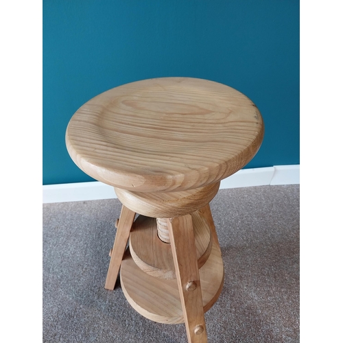 51 - Good quality pine revolving Artist stool {64 cm H x 40 cm Dia.}.