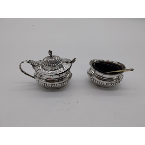 832 - English silver mustard pot & salt pot with original Bristol blue glass liners . Hallmarked in Birmin... 