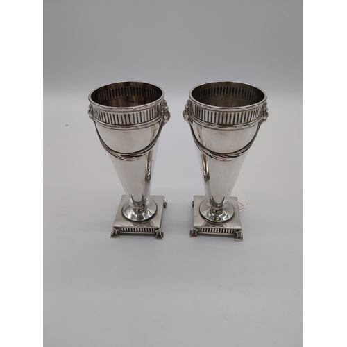 838 - Pair of English silver rose bud vases decorated with swags and lion's mask heads. Hallmarked in Shef... 