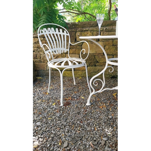 40 - Exceptional quality hand forged wrought iron Arras style circular garden table and two matching chai... 