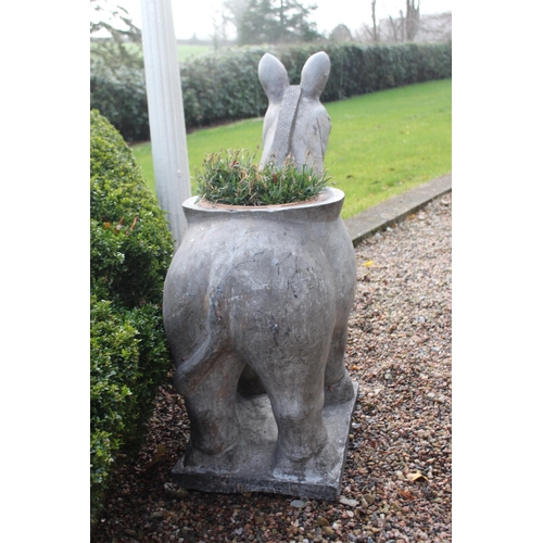 55 - Carved stone planter in the form of a foal {H 110cmx W 42cm x D 110cm }