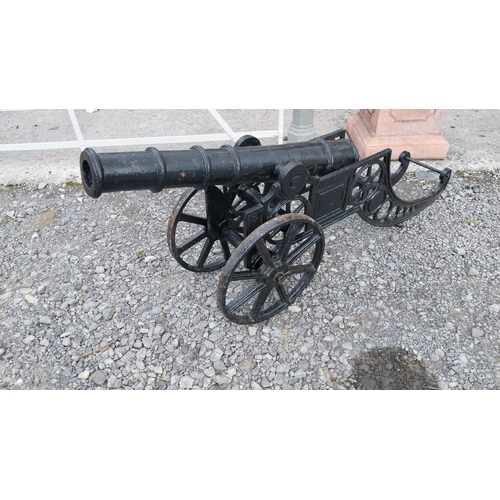 6 - Pair of good quality cast iron Cannons in the Georgian style {70 cm H x 156 cm W x 38 cm D}.