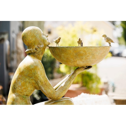 21 - Exceptional quality bronze water feature in the form of an Art Deco lady raised on cut limestone ped... 