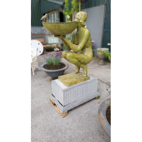 21 - Exceptional quality bronze water feature in the form of an Art Deco lady raised on cut limestone ped... 