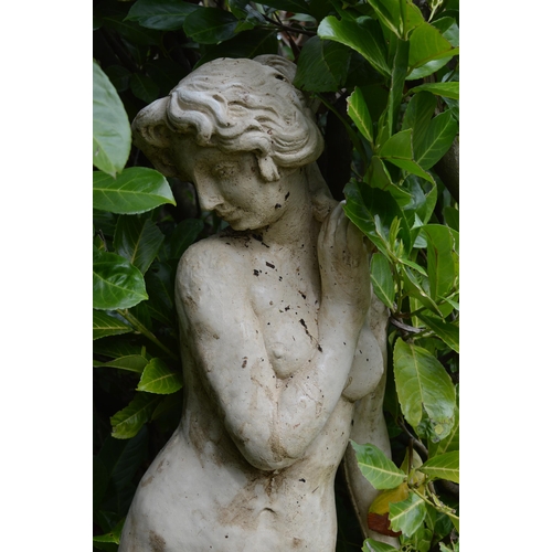 63 - Stone figure of elegant young lady on matching circular base {60 cm H x 36 cm Dia.}.