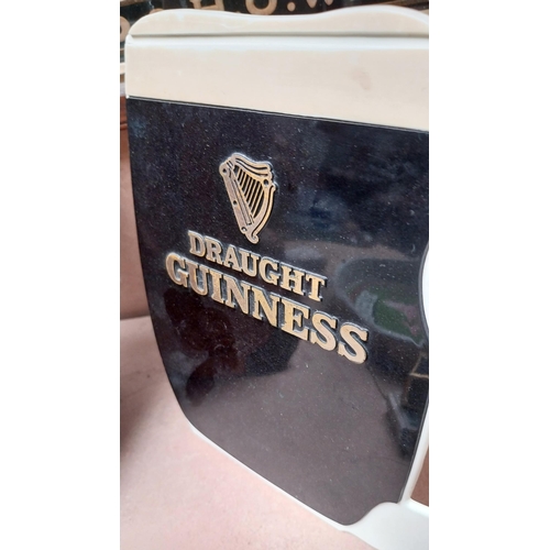 101 - Draught Guinness Perspex counter sign. {20 cm H x 23 cm W}.