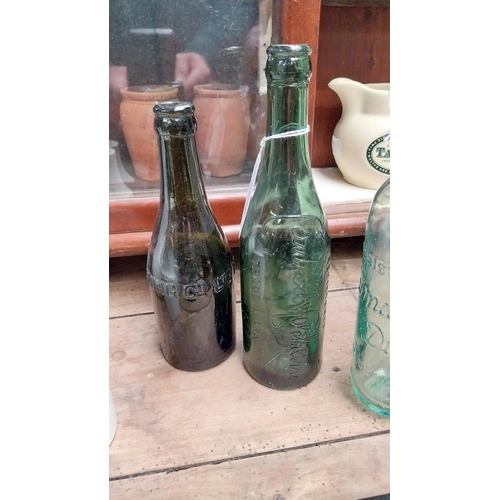 1034 - Two 19th C. bottles - Cantrell and Cochrane and Dublin Trading Co. {23 cm H}