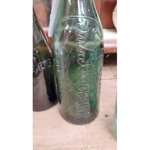 1034 - Two 19th C. bottles - Cantrell and Cochrane and Dublin Trading Co. {23 cm H}