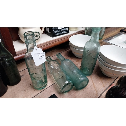 1035 - Four 19th C. bottles - Kernan's blob top and cod, Egan's of Tullamore and Taylors of Dublin. {23 cm ... 