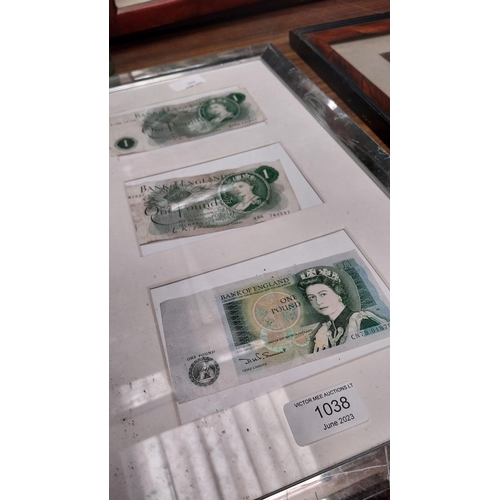 1038 - Framed set of Bank of England �1 notes. {47 cm H x 29 cm W}.