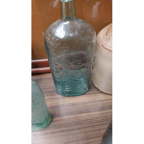 1043 - Three 19th C. bottles - Sir J Murray Fluid Magnesia.{25 cm H to 21 cm H}.