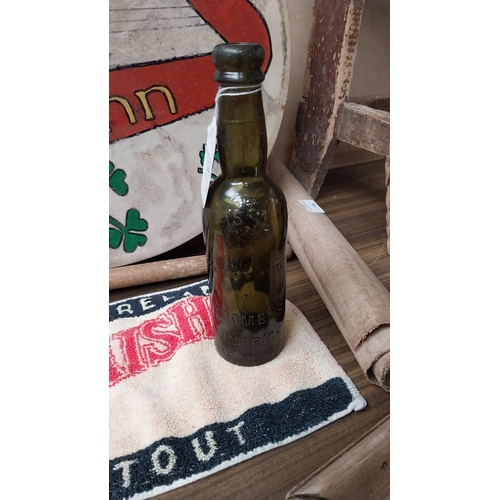 1048 - Glass beer bottle Toomeys of Limerick {23 cm H} and Beamish bar towel mat [20 cm H x 40 cm W}.