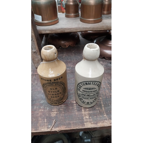 1053 - Two 19th C. ceramic ginger beer bottles - M P O'Brien Galteemore and Thwaites Dublin. {22 cm H}.