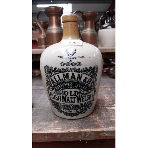 1054 - 19th C. stoneware flagon - Allman and Co Old Irish Malt Whisky. {20 cm H}.