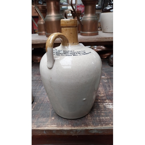 1054 - 19th C. stoneware flagon - Allman and Co Old Irish Malt Whisky. {20 cm H}.