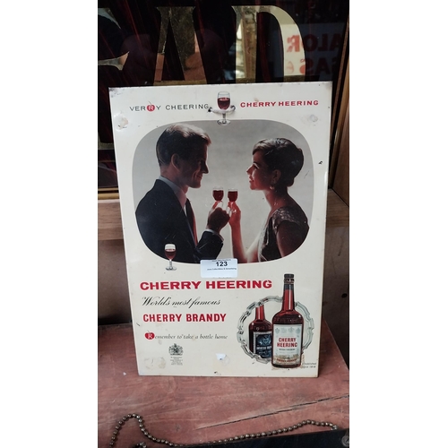 123 - Cherry Brandy celluloid advertising shelf sign {31 cm H x 21 cm W}.