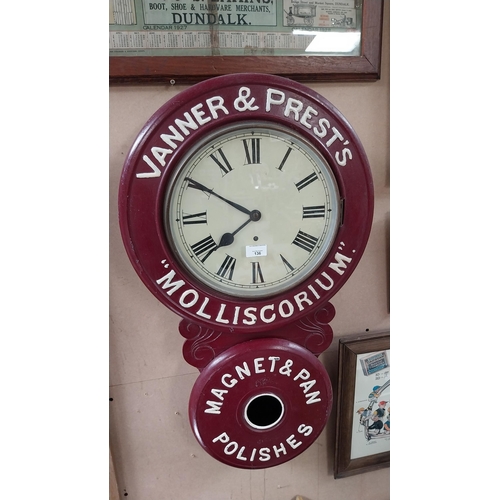 136 - Vanner & Prest's Molliscorium painted pine advertising clock. {78cm H X  47cm W}.