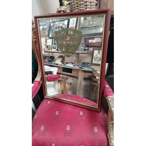 139 - John Powers and Sons Irish Whiskey advertising mirror. {67 cm H x 52 cm W}.