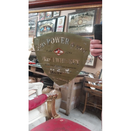 139 - John Powers and Sons Irish Whiskey advertising mirror. {67 cm H x 52 cm W}.