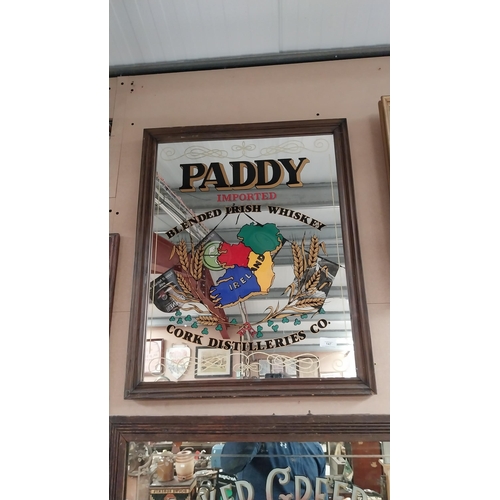 147 - Paddy Whiskey Cork Distillers framed advertising mirror.{72  cm H x 57 cm W}.