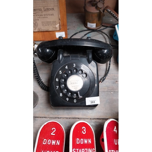 203 - 1970's Bakelite telephone.