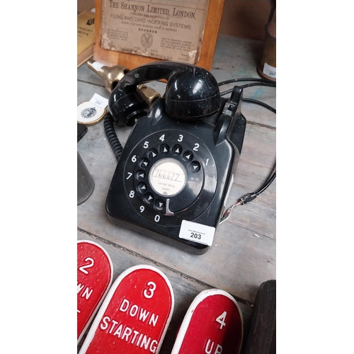 203 - 1970's Bakelite telephone.