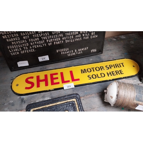 213 - Shell Motor Spirit Sold Here cast iron advertising sign. {9 cm H x 49 cm W}.