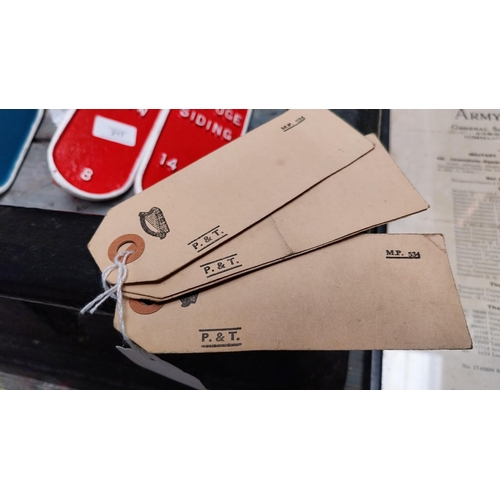 223 - Three P and T luggage labels.