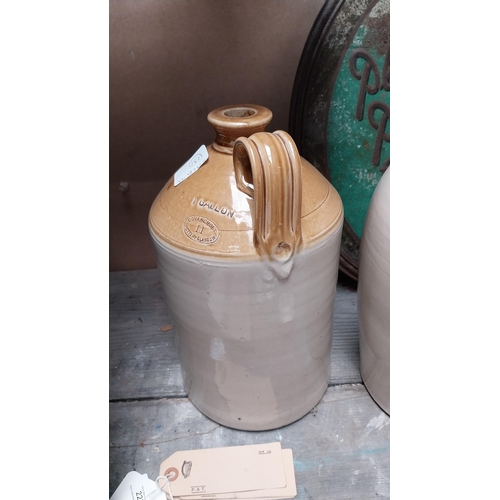 231 - Watt and Co Letterkenny stoneware flagon. {32 cm H x 17 cm Dia.}