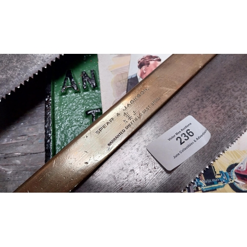 236 - Spear and Jackson Sheffield hand saw {15 cm H x 43 cm W} and Phila hand saw {17 cm H x 77 cm W}.